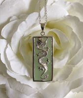 Oblong Jade and Silver Dragon Pendant with Silver Chain